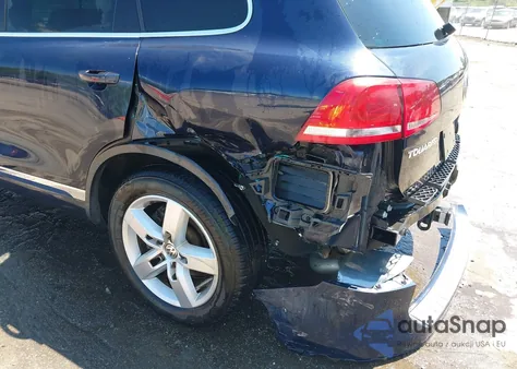 2011 Volkswagen Touareg Tdi Lux z USA, uszkodzony, nr VIN WVGFK9BPXBD003031